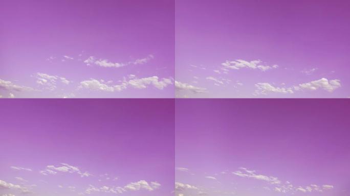 粉色天空和白色蓬松云的抽象颜色，顶部有复制空间