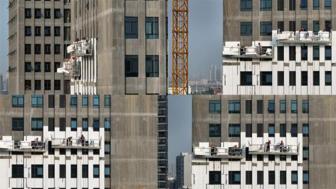 航拍城市高楼建设外墙吊蓝工人施工