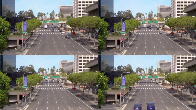 白天在城市内的洛杉矶道路上的交通，从上面拍摄的视频。美国洛杉矶-2021年4月14日