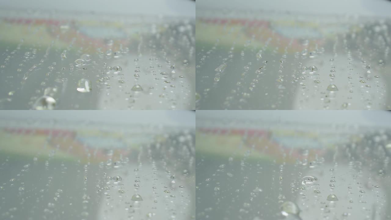 水滴，雨滴，水流过玻璃，有美丽的水滴。