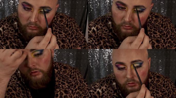 一名男性化妆师将产品涂在眉毛上的4k视频片段