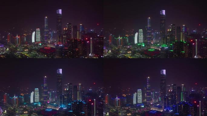 夜间照明广州市著名的现代市中心空中全景4k中国