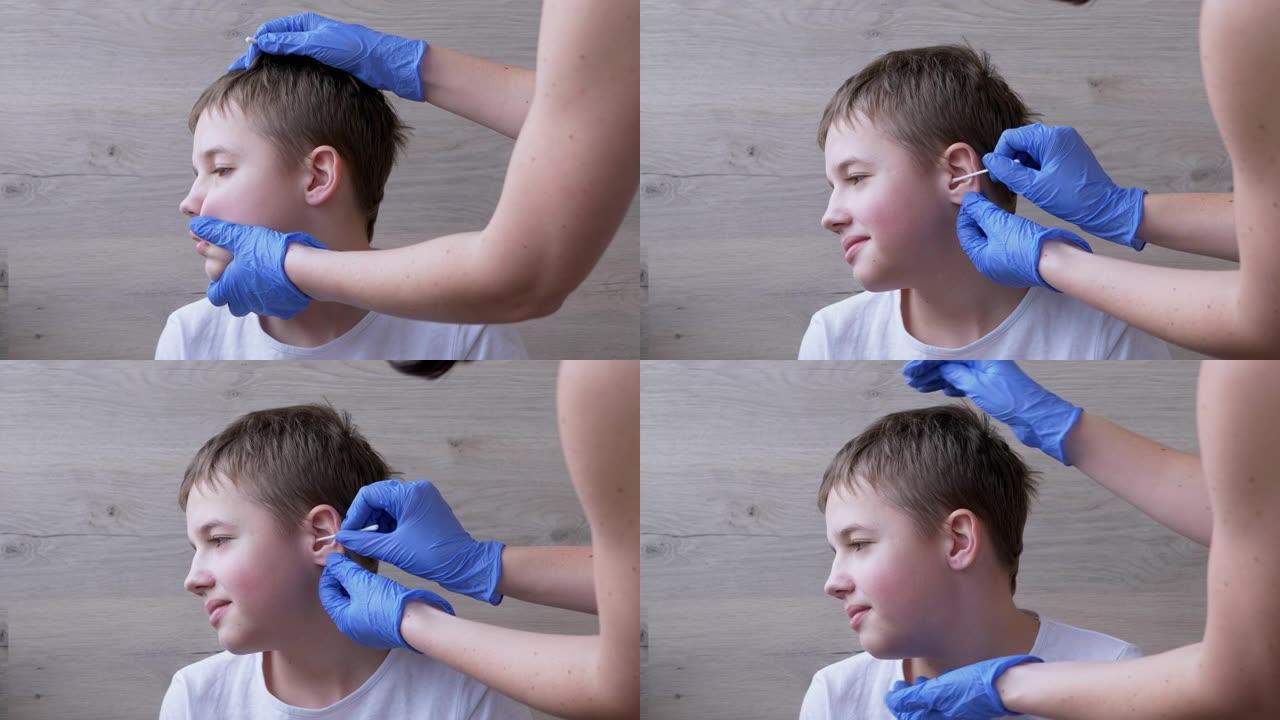 耳鼻喉科医生用棉签清洁孩子的耳朵，耳道。4K