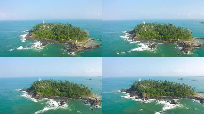 美丽的老白色灯塔在三尖岛。鸟瞰图4K。