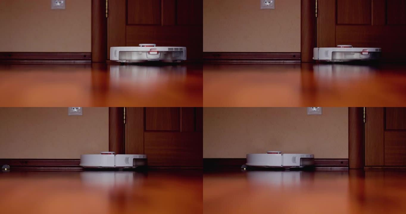 木地板激光雷达智能机器人真空吸尘器。机器人真空吸尘器对公寓进行自动清洁。4k慢动作100 fps，P