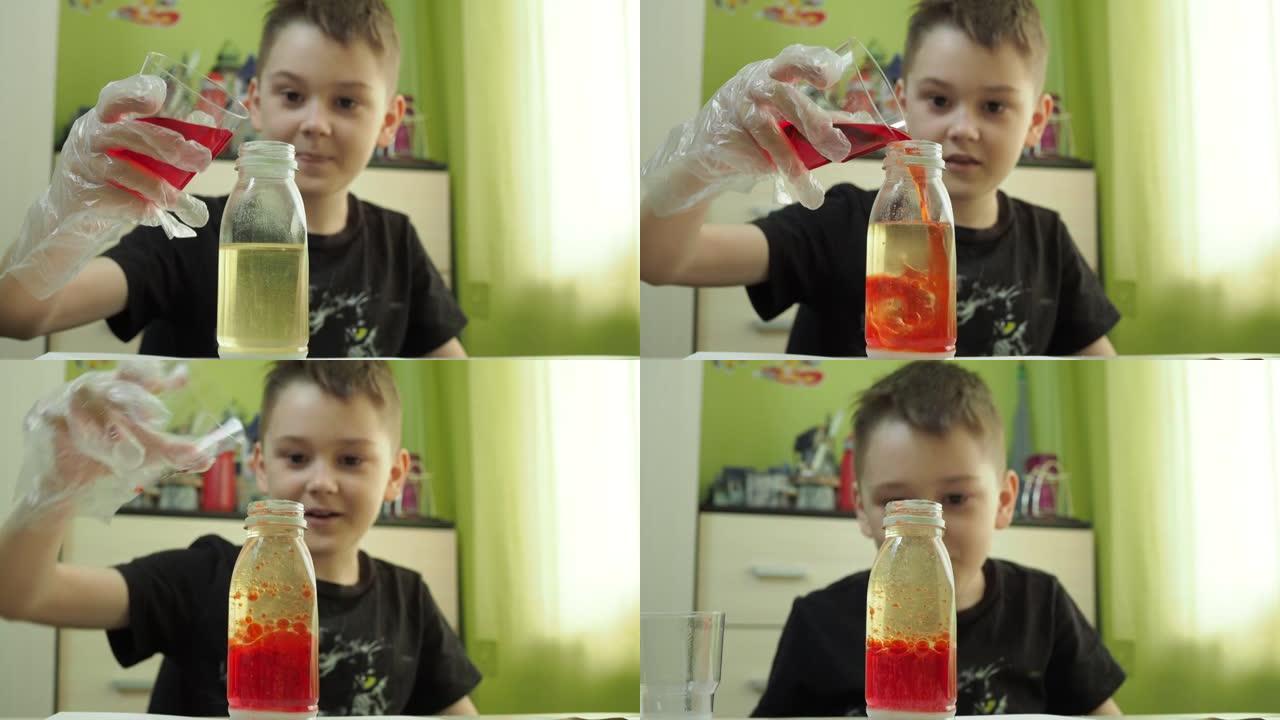 这个男孩在家进行化学实验。将带有染料的液体添加到油瓶中。一位年轻的化学家