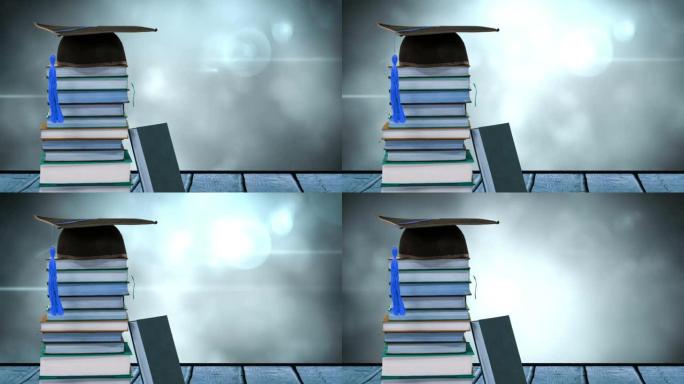 在发光的灯光上戴着毕业帽的书堆动画