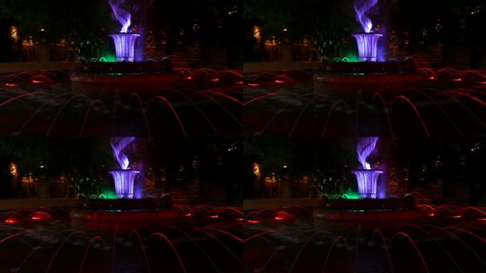 晚上，保加利亚索非亚总统府大楼前的彩色喷泉。
