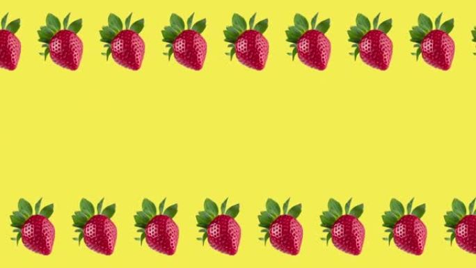 框架由许多新鲜的红色草莓在黄色背景上旋转特写，带有复制空间