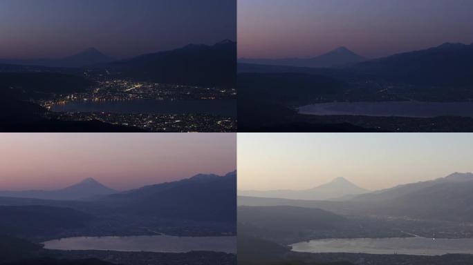 延时-富士山的黎明。从高卡布奇高原放大看到的富士湖和诹访湖