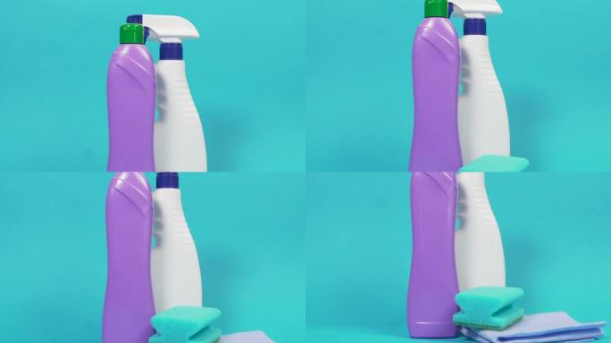 一瓶窗户清洁喷雾剂，紫色的带有家用化学药品。