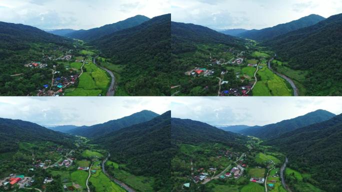 泰国南部普安区阳光明媚的夏日里，天空之路的空中俯视图与农田绿色丛林森林的背景视频