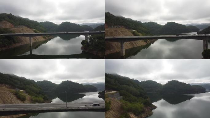 无人驾驶飞机在泰国南部的水库或河流上的高角度视图桥。雅拉省邦朗大坝上的桥路