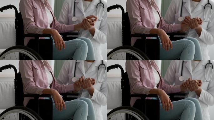 医生在室内轮椅上支持无法识别的残疾女孩，裁剪