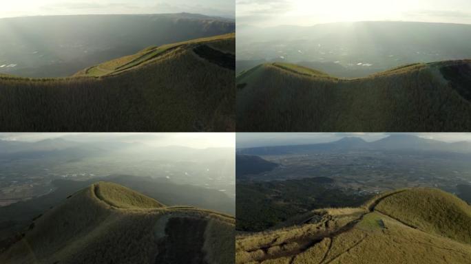 阿苏地质公园，视野极佳。日本熊本的无人机射击。多莉进来了。似乎漂浮在天空中的景色。你可以看到破火山口