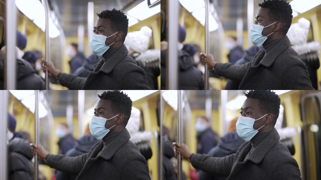 地铁地铁黑人手持酒吧戴covid外科口罩预防