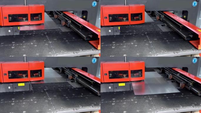 旋转数控冲孔，蚕食机在行动。金属穿孔工业机械
