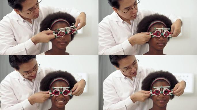 年轻的非洲妇女在验光师诊所检查眼睛。