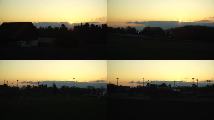 从日内瓦到洛桑的铁路边的金色日出早晨场景
