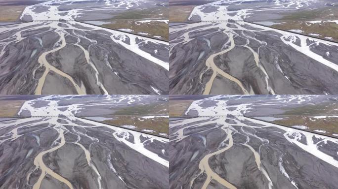 冰岛冰河系统的空中无人机视图。全球变暖和气候变化导致的冰川融化水