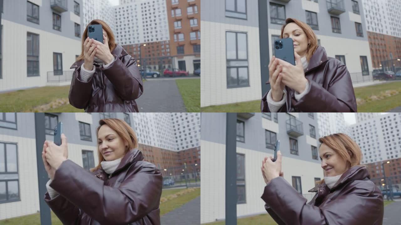 莫斯科，俄罗斯-11月，2020: 美丽的女人采取iPhone。行动。女人用专业相机在新的iPhon