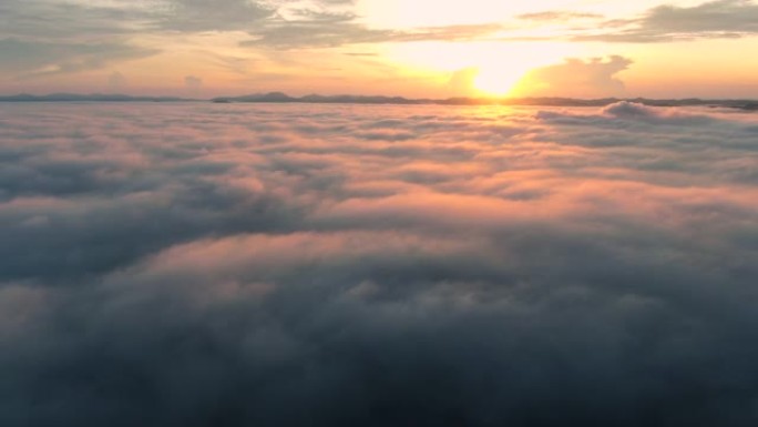 风景优美的空中无人机俯视图山脉美丽的日出雨林日出时有雾和薄雾，乐山，萨道，宋卡