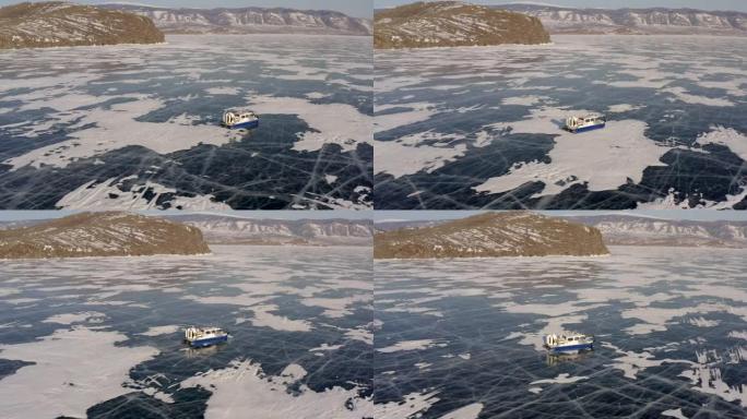 一艘气垫船高速冲过冰冻的贝加尔湖