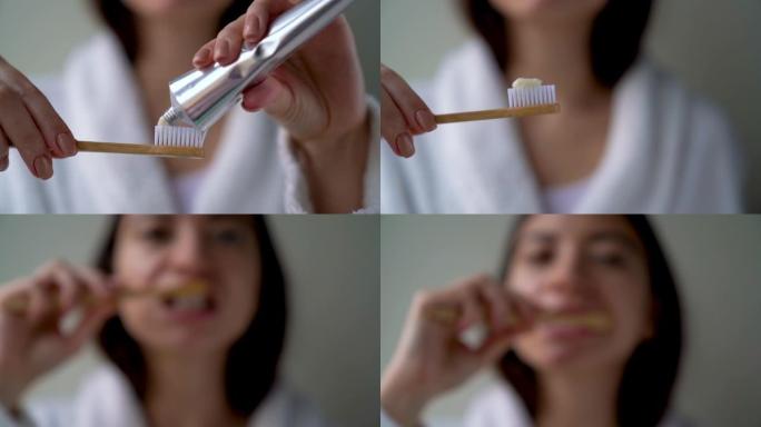 女人正在挤牙膏和清洁牙齿。