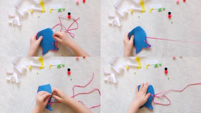 毛毡工艺。在家与孩子一起进行创造性活动。缝纫毛绒玩具，爱好。工作场所。