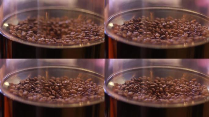 咖啡豆流入研磨机，采用特定的聚焦技术拍摄。