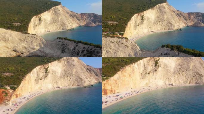 带有岩石海景的绿松石海和沙滩的无人机视图