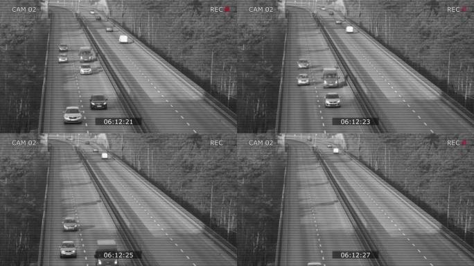 在森林中行驶高速公路立交桥的汽车的闭路电视安全摄像机视图