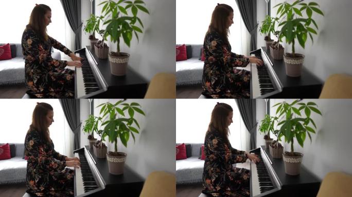 女钢琴家在家中的房间里作曲