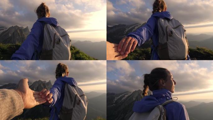 女徒步旅行者握着同伴的手，将他带到山顶。徒步旅行情侣牵手，跟着我去概念
