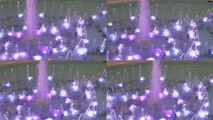 不同尺寸的紫色照明喷泉变色