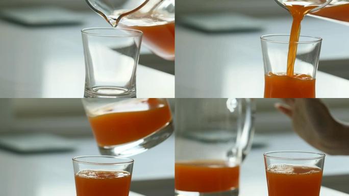 橙汁从水罐中倒入玻璃杯中