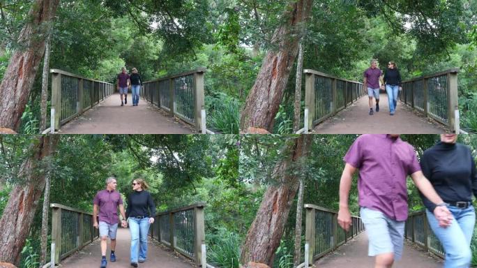 成熟的毛利人和他的妻子一起在公园散步