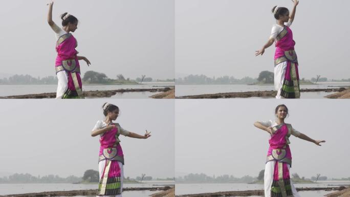 一位bharatnatyam舞者在帕瓦加德 (Pavagadh) 的瓦达塔拉夫湖 (Vadatala