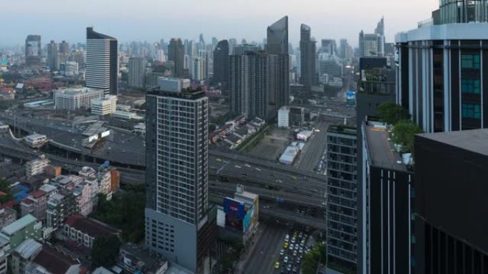 曼谷城市景观的延时电影，商业区，黄昏高建筑 (泰国曼谷)