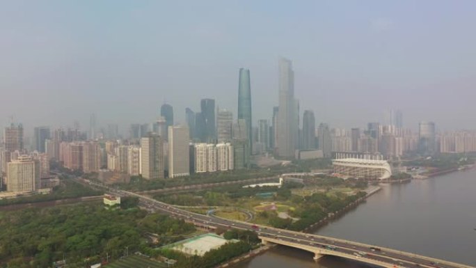 阳光明媚的日子广州市市中心交通大桥著名塔河畔空中全景4k中国