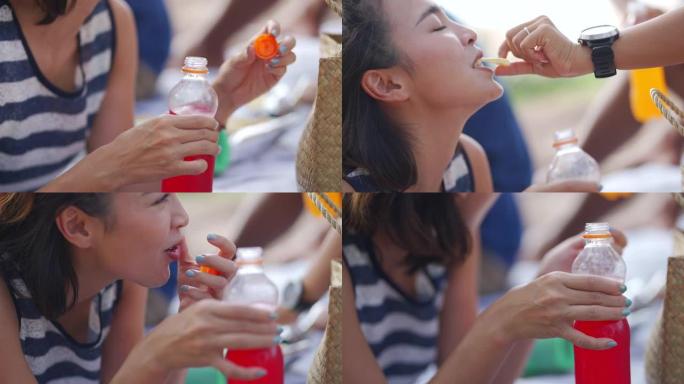 4k组亚洲男女朋友暑假一起在海滩野餐