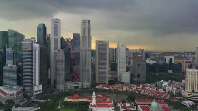 日落时间飞越新加坡城市著名的滨海湾市中心空中全景4k