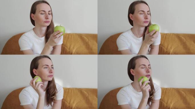 女人手捧青苹果健康饮食理念