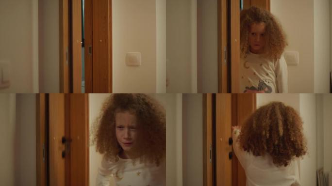 可爱的八岁卷毛女孩打开门，离开房间。
