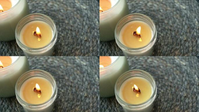 慢动作蜡烛火焰与木制灯芯。美丽的火，特写