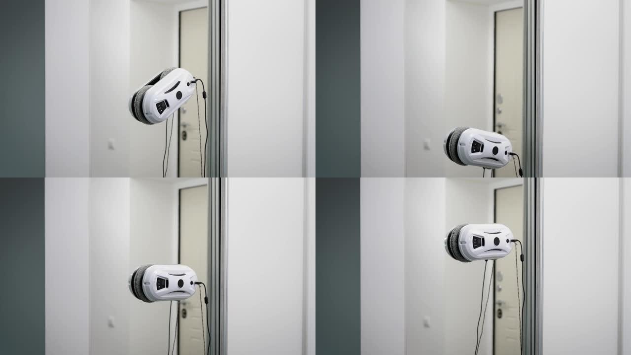 在家工作时清洁机器人。机器人清理走廊里的镜子