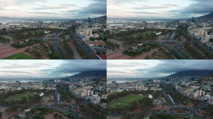 在壮观的日落期间，以桌山为背景，向开普敦市进行了广泛的空中拍摄。