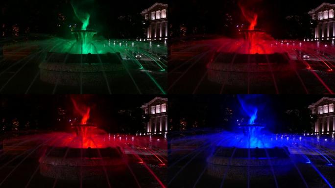 晚上，保加利亚索非亚总统府大楼前的彩色喷泉。