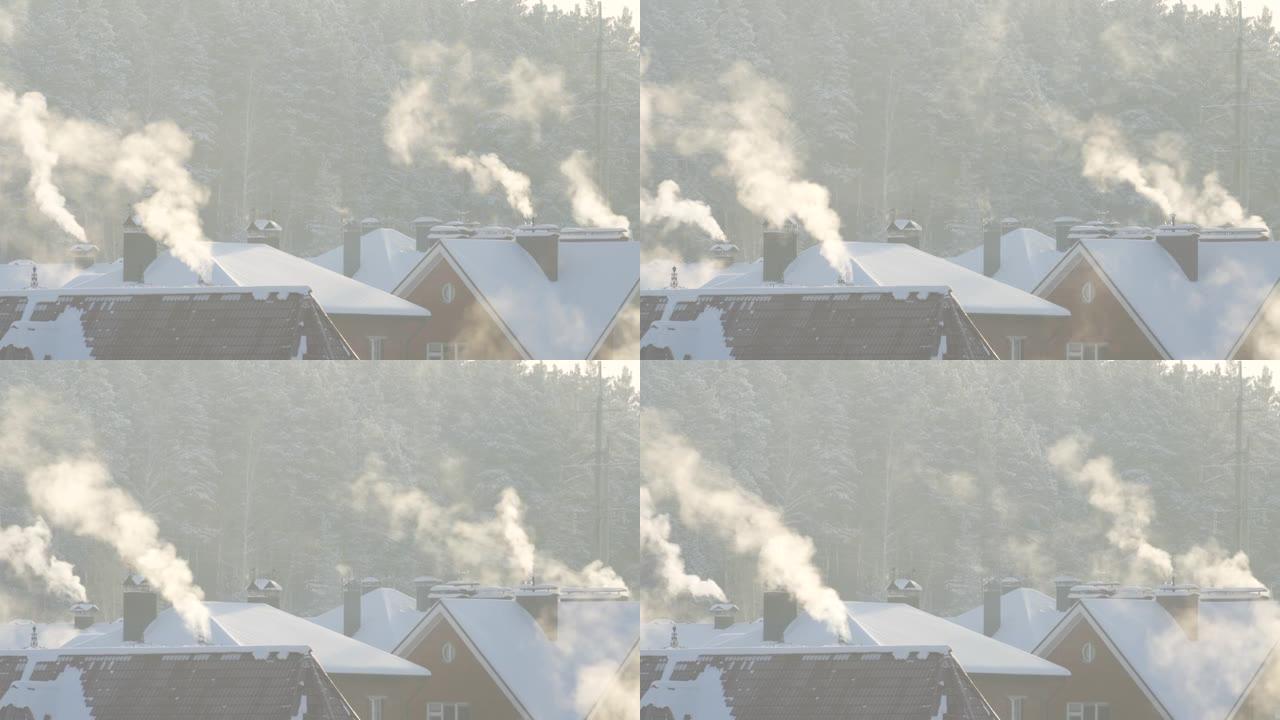 清晨在一个村庄里，房屋屋顶上的管道冒出浓烟