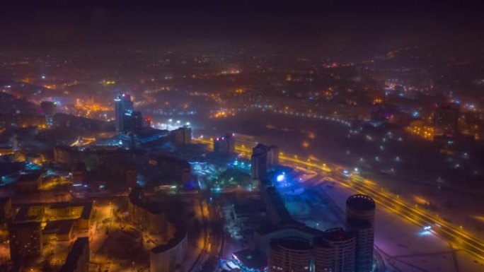 夜间冬季照明明斯克市中心空中全景4k延时白俄罗斯